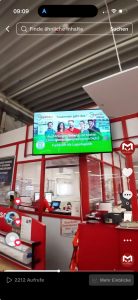 Großer Bildschirm im Kassenbereich des Hagebau Centrum Salzwedel zeigt lokale Spots – lokales Display Marketing im Einsatz.
