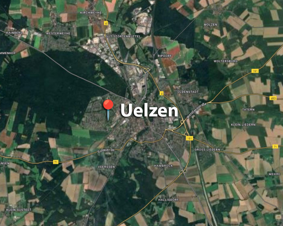 Satelliten-Kartenausschnitt von Uelzen mit Standort-Pin und Beschriftung.